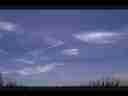 jet trail fragment expands in natural-looking  cirrus clouds timelapse Cat.#V00411, 720x480 Motion JPEG (.AVI), 7 sec. at 30fps 