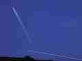 2 long comet-style jet trails almost intersect � digitally upscaled timelapse scene from Stitching the Sky Cat.#V00421x, 1280x720 Motion JPEG (.AVI), 3 sec. at 30fps 