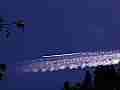 Comet-style jet trail parallels old fat drifter � digitally upscaled timelapse scene from Stitching the Sky Cat.#V01099x, 1280x720 Motion JPEG (.AVI), 4 sec. at 30fps 