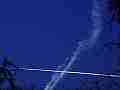 Jet streaks across old trail behind trees timelapse � digitally upscaled scene from Stitching the Sky Cat.#V01214x, 1280x720 Motion JPEG (.AVI), 5 sec. at 30fps 