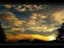 Amazing multi-layer orange cirrus sunrise timelapse Cat.#V01774, 720x480 Motion JPEG(.AVI), 14 sec. at 30fps 
