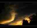 Catalog#:V02577 License:$80.00, Format:720x480 Motion JPEG(.AVI) at 30fps, Length: approx.15 sec. Stringy stratus backlit at sunset timelapse