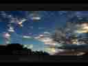 Catalog#:V03010 License:$72.00, Format:1920x1080 Motion JPEG(.AVI) at 30fps, Length: approx.13 sec. Slow mottled high cloud drift sunrise time lapse(1)