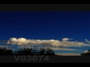 Cumulus cloud band in bright blue sky HD Cat.#V03074, 1920x1080 Motion JPEG (.AVI), 28 sec. at 30fps 