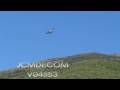 Timelapse High Voltage tower construction Kaman K-Max helicopter lowers part Cat.#V04553, 1920x1080 Motion JPEG (.AVI), 16 sec. at 30fps 