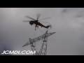 Sikorsky S-64 Skycrane sets 500Kv Tower top into place and awaits OK to release from spotter helicopter Cat.#V04875, 1920x1080 H.264 AVCHD (.MTS), 50 sec. at 30fps 