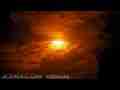 Filtered high clouds passing in front of sun timelapse Cat.#V05636, 1920x1080 Motion JPEG (.AVI), 30 sec. at 30fps 
