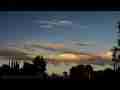 Jet trail passes over alto-cumulus timelapse multi-layer Cat.#V05907, 1920x1080 Motion JPEG (.AVI), 24 sec. at 30fps 