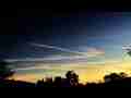 Jet trails drifting at sunrise time lapse Cat.#V07106, 1920x1080 Motion JPEG (.AVI), 24 sec. at 30fps 