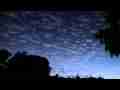 Catalog#:V07117 License:$80.00, Format:1920x1080 Motion JPEG(.AVI) at 30fps, Length: approx.11 sec. Mottled high cloud sky sunset fade-out time lapse
