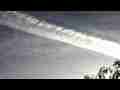 Amazing jet trail expansion with shadow timelapse Cat.#V07618, 1920x1080 Motion JPEG (.AVI), 33 sec. at 30fps 