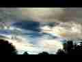 Multi-layer cumulus/cirrus clouds over trees timelapse Cat.#V10151, 1920x1080 Motion JPEG (.AVI), 26 sec. at 30fps 