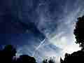 Jet trail fragment expands and drifts across soupy sky timelapse Cat.#V10728, 1920x1080 Motion JPEG (.AVI), 15 sec. at 30fps 