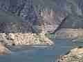 Fire helicopter hovers over water while loading tank (Castaic Warm Fire) Cat.#V18938, 1920x1080 H.264/avc1(.MOV), 45 sec. at 29.971fps 