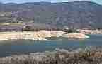 California extreme drought low water (Castaic Lake, pan left) Cat.#V18962, 1920x1080 H.264/avc1(.MOV), 10 sec. at 29.971fps 