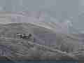 Super scoopers long climbout with hilly BG Cat.#V22883a, 1920x1080 H.264/MPEG-4 AVC/avc1(.MP4), 13 sec. at 23.976fps 